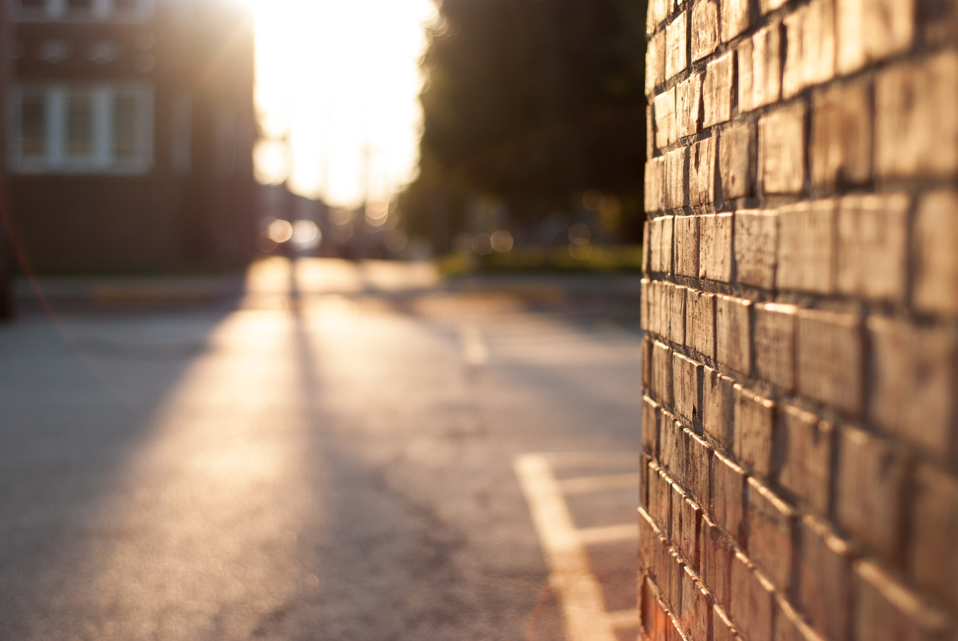 An image showing spalling brickwork on a wall, highlighting the need for replacement bricks to be chosen and prepared carefully.